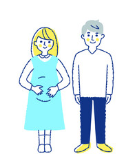 笑顔で立っている妊婦とパートナーの男性