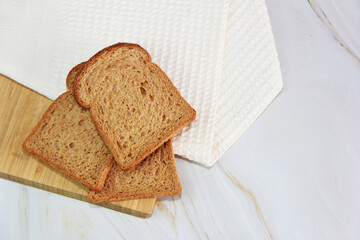 square slice of toasted rye bread