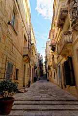 Fototapeta na wymiar Typical narrow street in Vittriosa - Birgu - Valletta