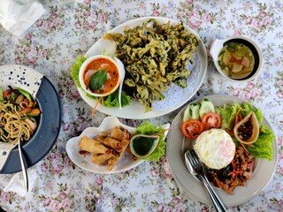 Many Thai dishes, ready to eat, top view.