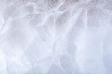 The texture of the ice surface close-up.