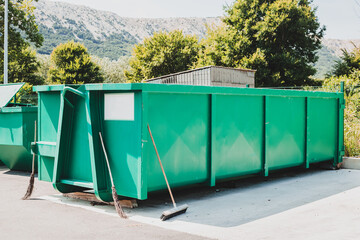 Large waste container at local sorting station - obrazy, fototapety, plakaty