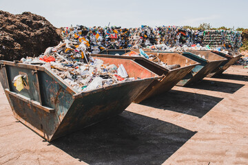 Stack of different types of garbage at city dump - obrazy, fototapety, plakaty