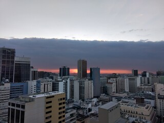 Sunset view of downtown Rio de Janeiro on a cloudy day, Brazil.