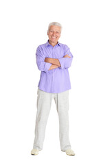 portrait of smiling senior man on white background