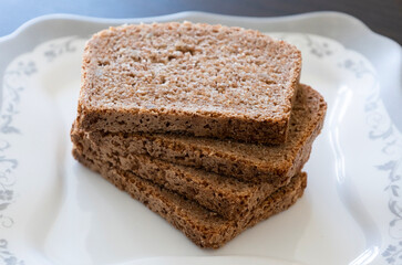 wheat bread slices close up on white background