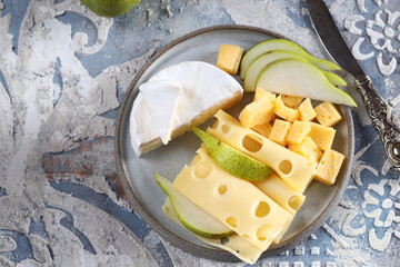 appetizer cheese plate with fresh pear