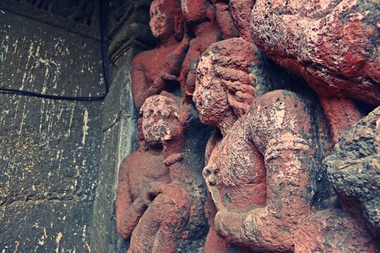sculpture and carving at lonad caves , than city . maharashtra state , india 