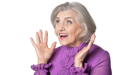 Portrait of emotional senior woman posing isolated on white background