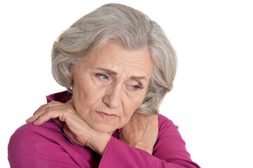 Portrait of sad senior woman posing isolated