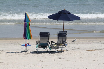 Colorfull beach chairs found on various settings