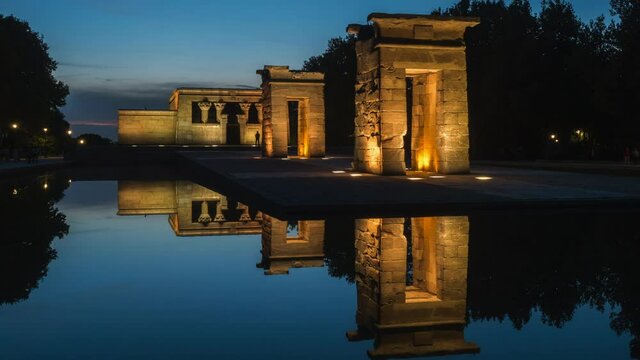 Madrid, Spain, zoom out time lapse view of historical landmark Temple of Debod at dusk.	
