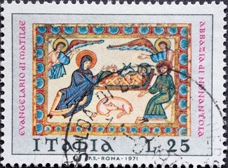 Italy - circa 1971: a postage stamp from Italy showing the Holy Family. Christmas Postage stamp 1971