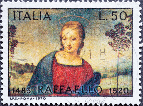 Italy - circa 1970: a postage stamp from Italy showing a section of the painting Madonna with the Goldfinch, Raphael