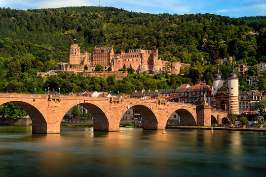 Historic castle and the Old Bridge in Heidelberg, Germany, shot in warm summer evening sunlight