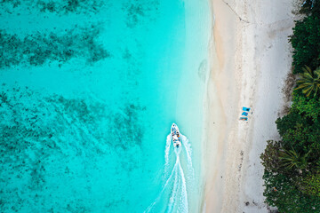 Coral island, koh He, beach and boats in Phuket province, Thailand