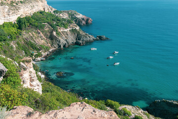 Fototapeta premium Rock in the sea bay. Sea bay rock view. Landscape of sea bay . Blue Lagoon
