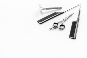 Barber tools with hairdressing scissors and combs