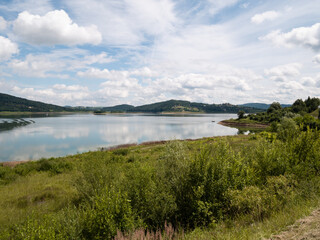 Fototapeta na wymiar Lake Mucharz (Jezioro Mucharskie) reservoir landscape in Jaszczurowa – Jamnik, Świnna Poręba, Lesser Poland Voivodeship (Małopolskie).