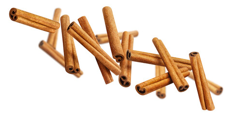 Flying cinnamon sticks, isolated on white background