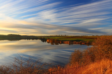 Fototapeta na wymiar Beautiful Sky just before Sunset at Hurworth Burn Reservoir, County Durham, England, UK.