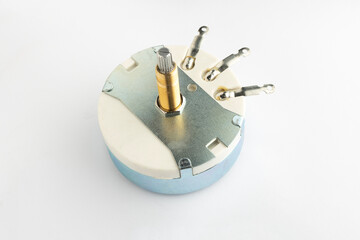 An l-pad attenuator potentiometer on white background