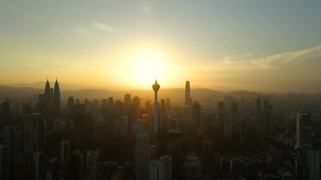 Aerial Footage sunrise view of Kuala Lumpur City Centre with four tallest skyscrapper 