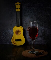 acoustic guitar and wine 