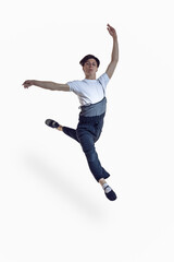 Ballet Dance Concepts. Professional Caucasian Male Ballet Dance Performing in Flight With Hands Outspread in Studio Against White Background.