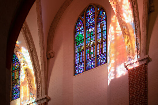 The glimpses, the displays, the play of light created by the rays of the sun passing through the stained glass window in the church