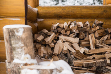 snow-covered firewood