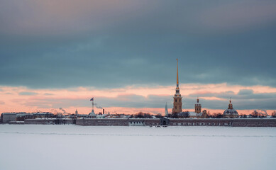 Fototapeta na wymiar Panoramic view of the Peter and Paul Fortress in St. Petersburg in winter early in the morning. Attraction of St. Petersburg, Russia.