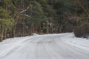A forest road in a winter forest