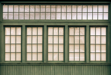 green painted warehouse office windows vintage style building design architecture