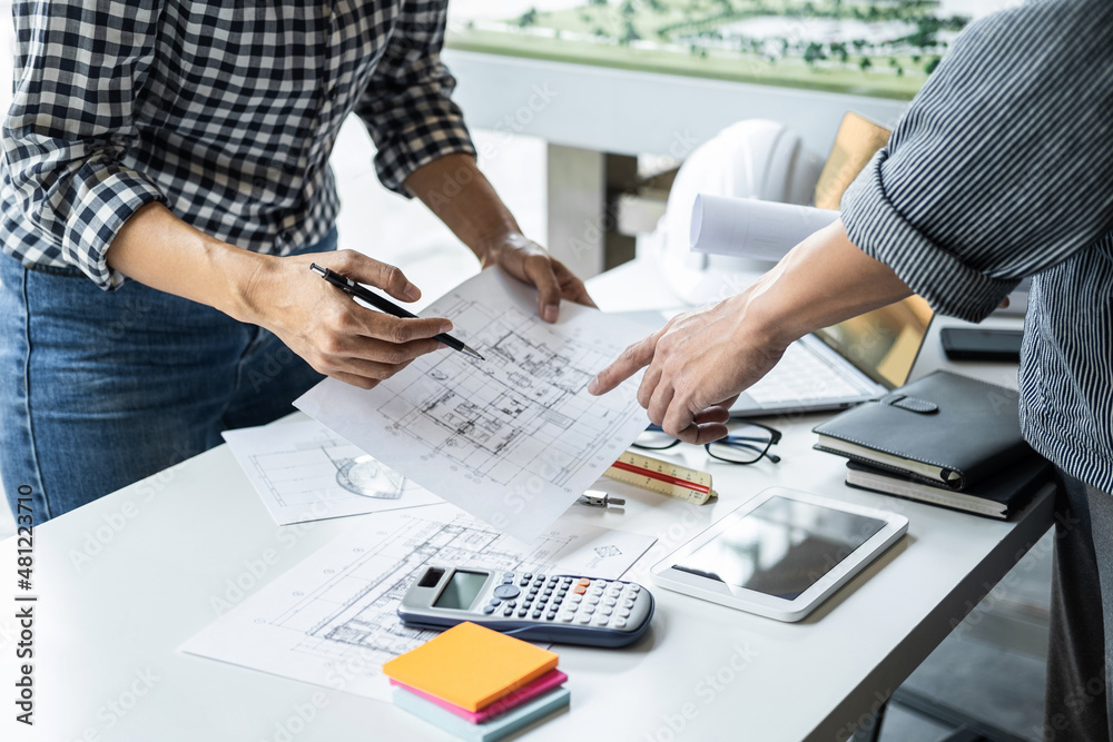 Wall mural construction and structure concept of engineer or architect meeting for project working with partner