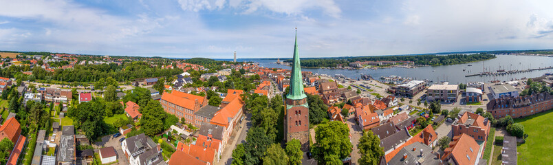 Fototapeta premium Panoramic aerial view of Travemunde cityscape on a clear sunny day, Lubeck District - Germany.