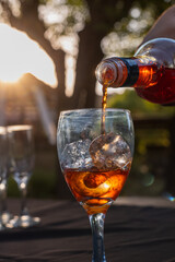 whiskey being poured into glass