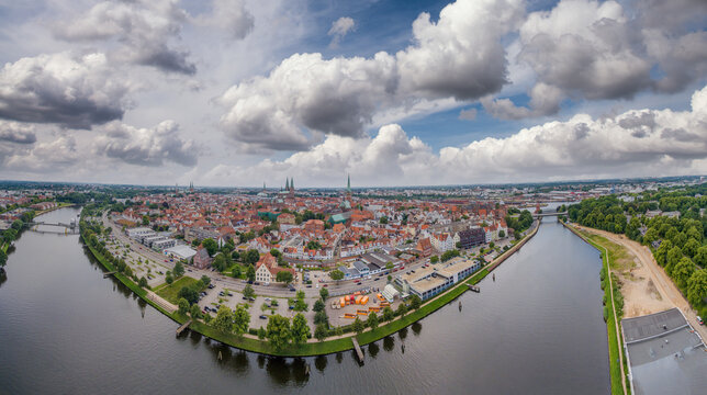 Panoramic aerial view of Lubeck cityscape on a cloudy day, Germany.