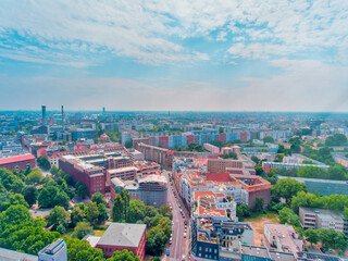 Aerial view of Berlin cityscape from drone in summer season with city landmarks and blue sky, Germany