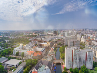 Obraz premium Aerial view of Berlin cityscape from drone in summer season with city landmarks and blue sky, Germany