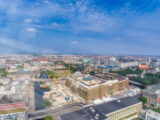Aerial view of Berlin cityscape from drone in summer season with city landmarks and blue sky, Germany