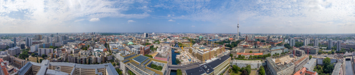 Obraz premium BERLIN, GERMANY - JULY 24, 2016: Panoramic aerial view of Berlin skyline at sunset with major city landmarks along Spree river.