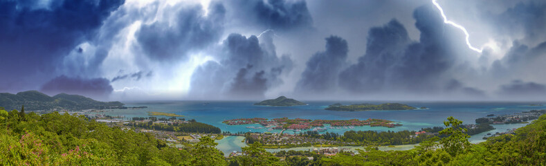 Naklejka na ściany i meble Panoramic aerial view of Eden Island and Mahe seascape from the hill during a storm, Seychelles.