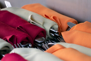 Cutlery wrapped up on fabric serviette