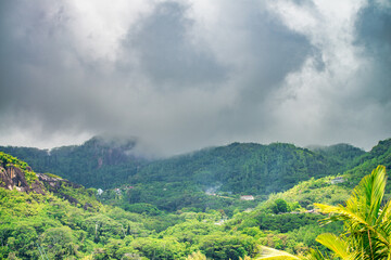 Mountains of Mahe with cloudy sky, Seychelles.