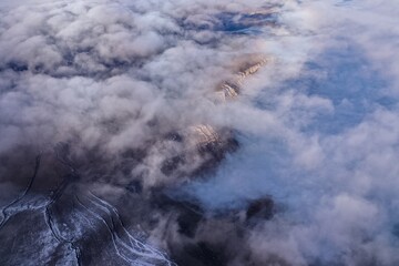 aerial view of clouds over the mountains