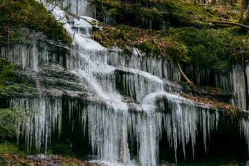 Hanging Icicles on rocky cliffs