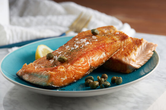 Delicious baked fish fillet with lemon