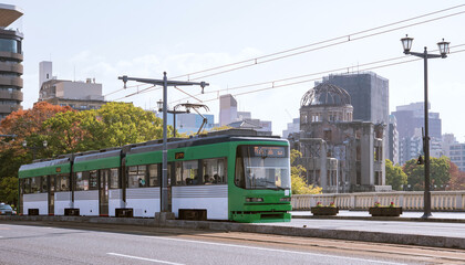 Hiroshima Electric Railway tram and Atomic Bomb Dome　広島の路面電車「広島電鉄」と原爆ドーム - obrazy, fototapety, plakaty