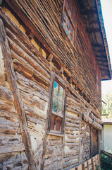 Historical Ottoman House. Wooden textured walls, wooden window and wooden beam.